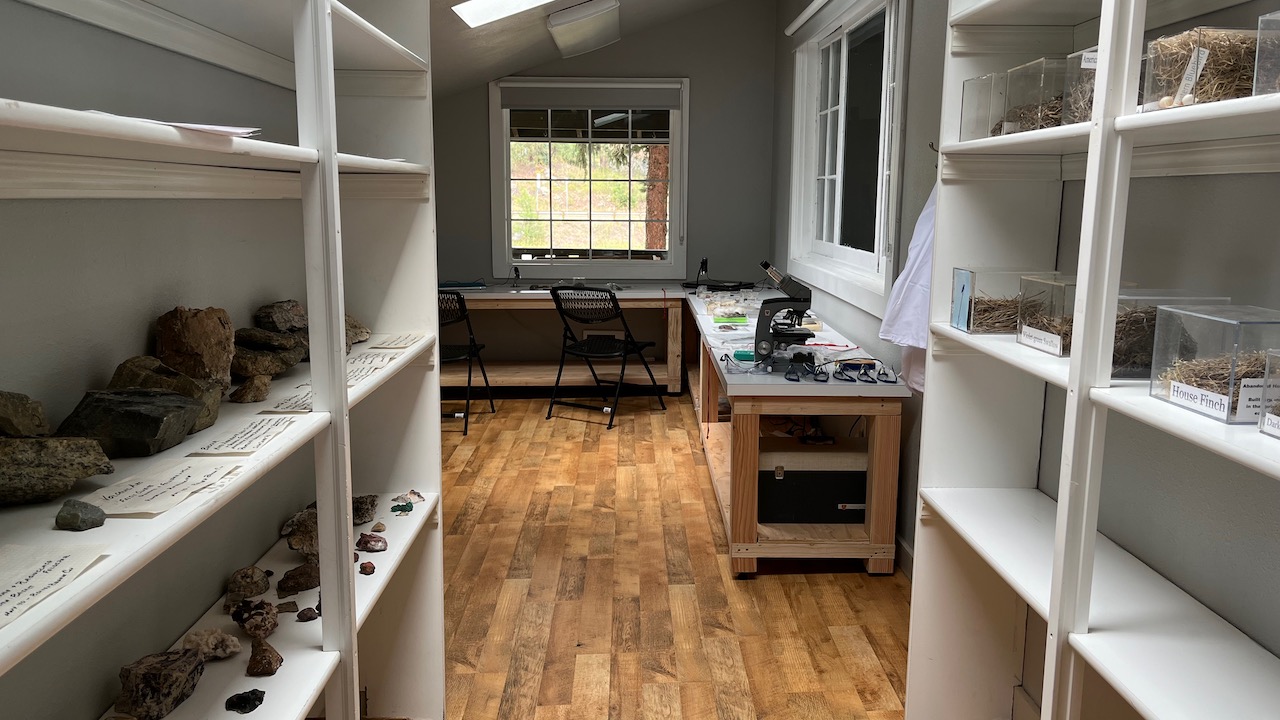 room with white shelves and lab tables